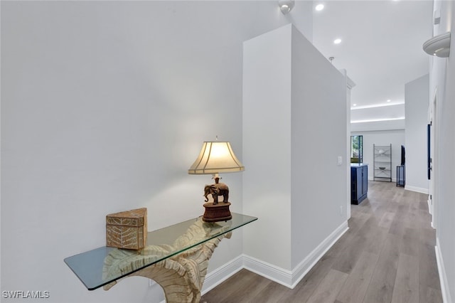 corridor featuring light hardwood / wood-style floors