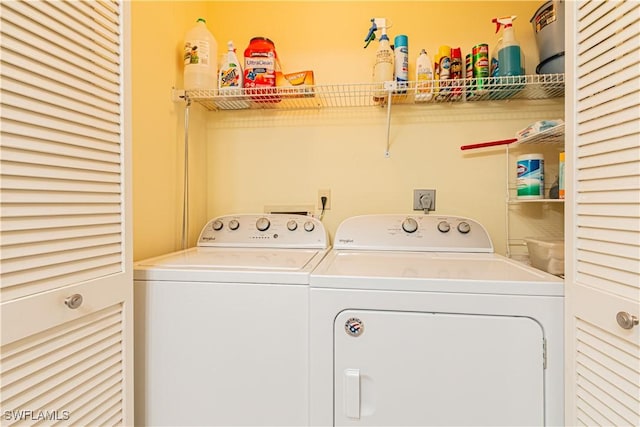 washroom featuring washer and dryer