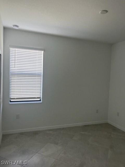 view of tiled empty room