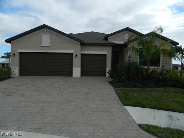 single story home with a garage