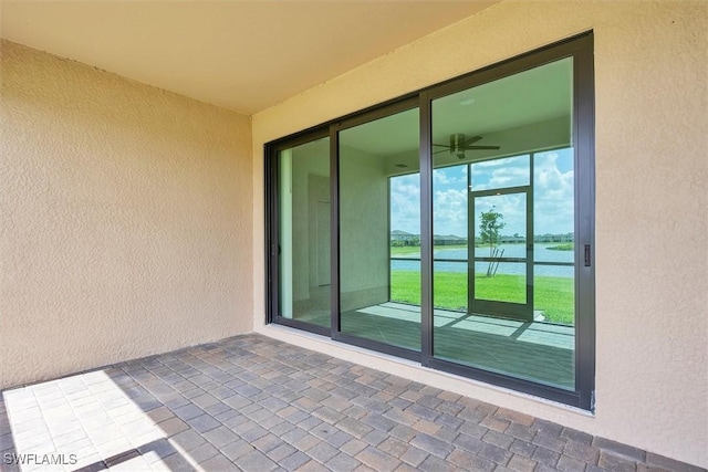 view of patio / terrace featuring a water view