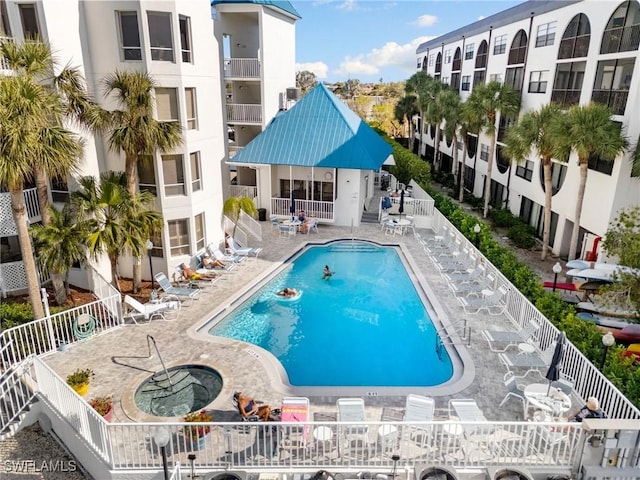 view of pool featuring a patio