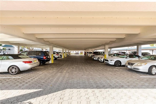 view of car parking featuring a carport