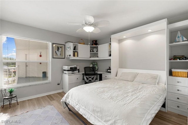 bedroom featuring ceiling fan and light hardwood / wood-style floors