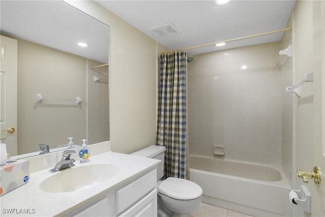 full bathroom featuring toilet, tile patterned floors, vanity, and shower / bathtub combination with curtain