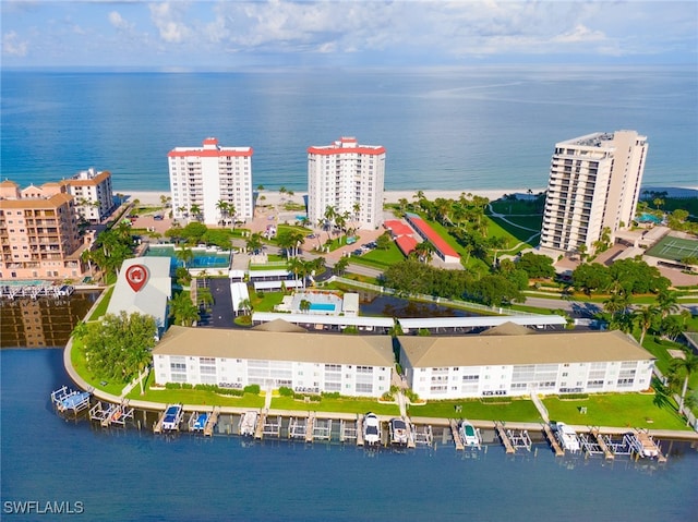 birds eye view of property featuring a water view