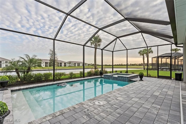 view of swimming pool with an in ground hot tub, a water view, a patio area, and a lanai