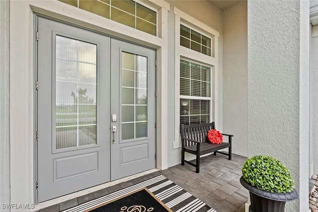 property entrance featuring french doors