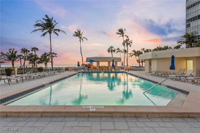 community pool with a patio area