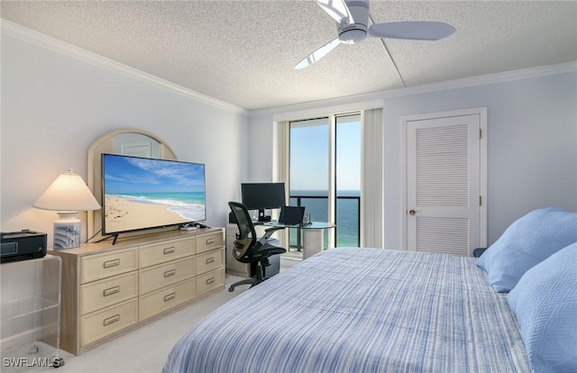 bedroom with light colored carpet, a textured ceiling, crown molding, and ceiling fan