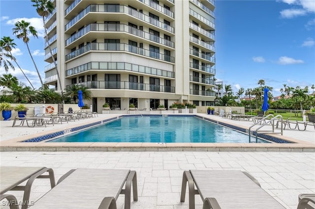 community pool featuring a patio