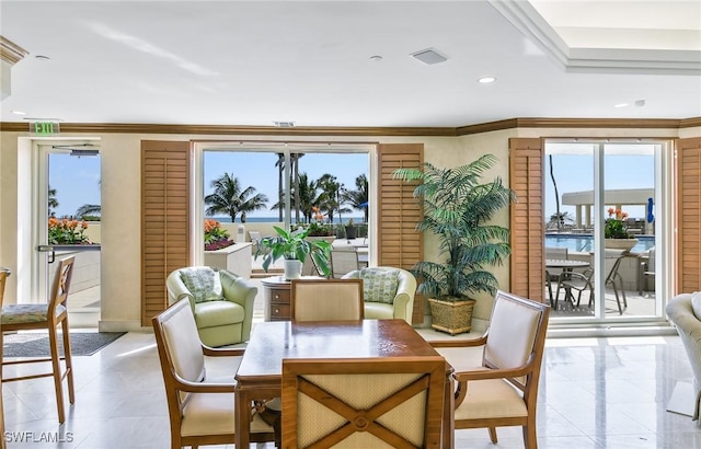 dining area featuring light tile patterned floors, recessed lighting, and crown molding