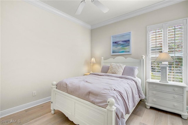 bedroom with light hardwood / wood-style flooring, ceiling fan, and ornamental molding