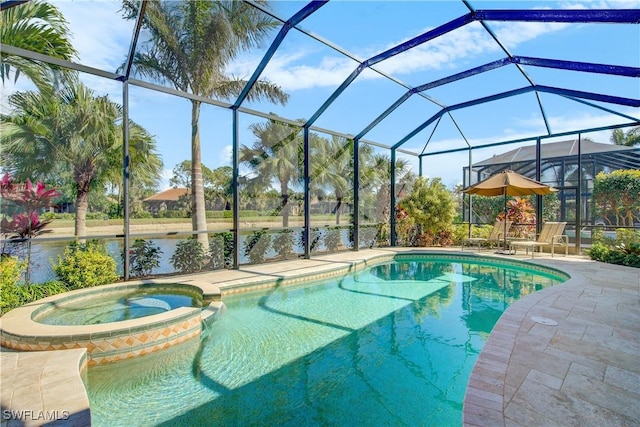 view of swimming pool with an in ground hot tub, a water view, a patio area, and a lanai