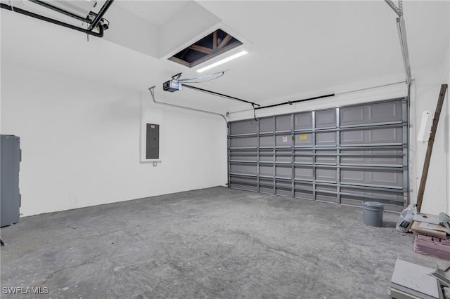 garage with electric panel and a garage door opener