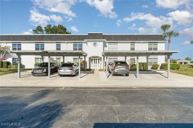 view of property with covered parking