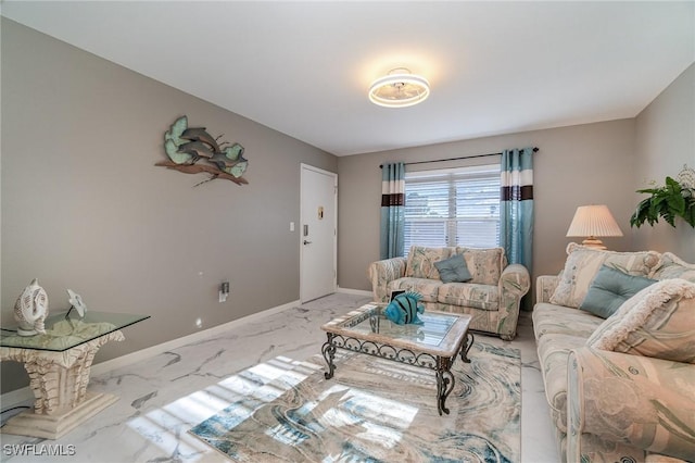living area with light marble finish floors and baseboards