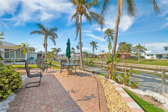 view of home's community featuring a patio