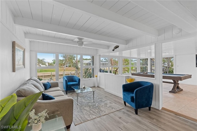 sunroom with beamed ceiling, ceiling fan, and billiards