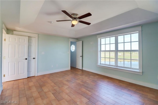 interior space with ceiling fan and light hardwood / wood-style flooring