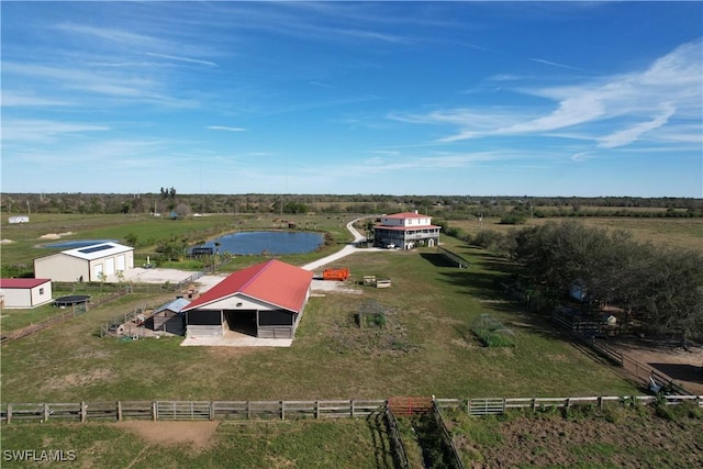 bird's eye view featuring a rural view and a water view