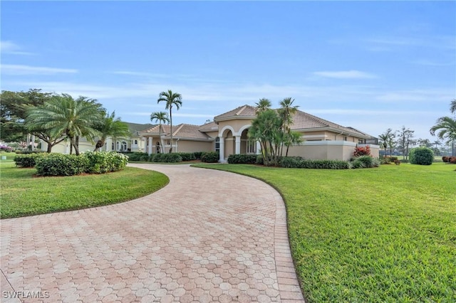 view of front of home with a front lawn