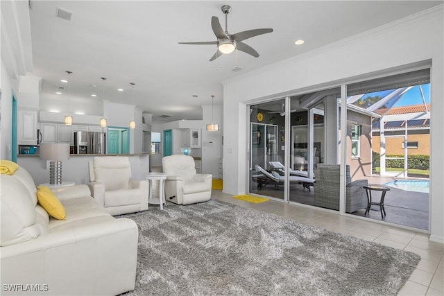 tiled living room featuring ceiling fan and crown molding