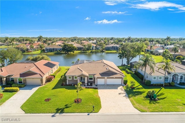 drone / aerial view with a water view