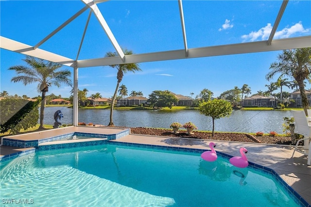 view of pool with a lanai and a water view