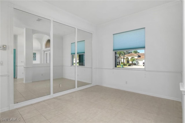 view of tiled spare room