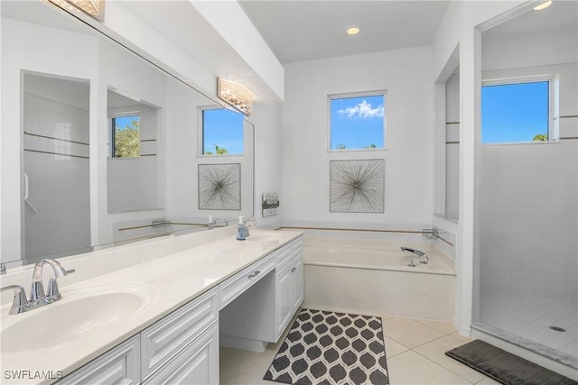 bathroom featuring separate shower and tub, tile patterned flooring, and vanity