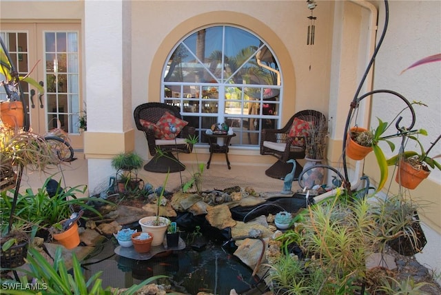 view of patio featuring french doors