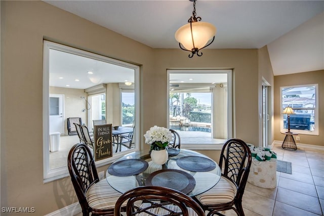 dining room featuring a wealth of natural light and light tile patterned floors
