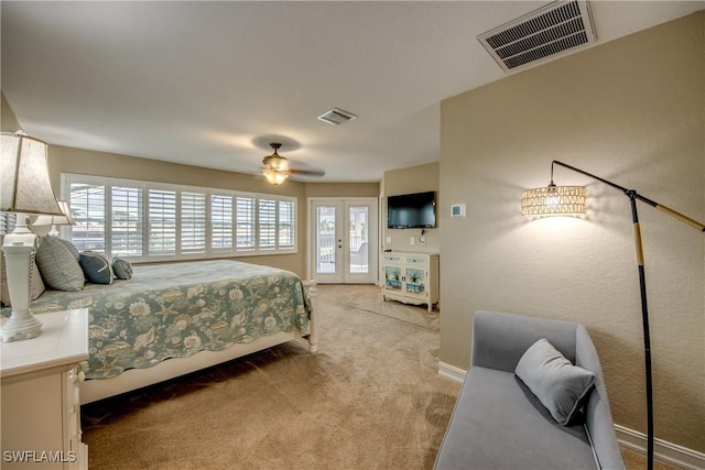 bedroom with ceiling fan, access to exterior, carpet floors, and french doors