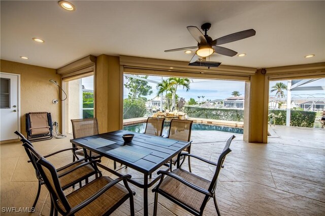 view of patio / terrace featuring ceiling fan