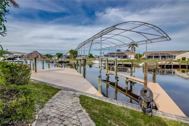 dock area featuring a water view