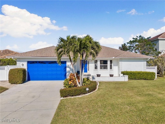 single story home featuring a front yard and a garage