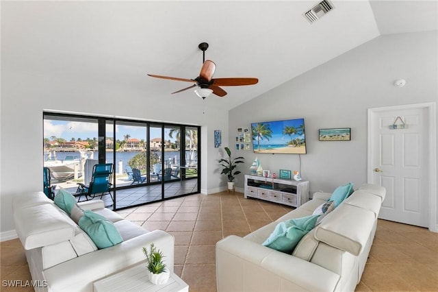 tiled living room featuring high vaulted ceiling and ceiling fan