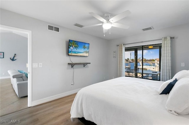 bedroom featuring ceiling fan, access to outside, and light hardwood / wood-style flooring