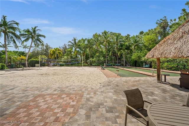 surrounding community featuring volleyball court