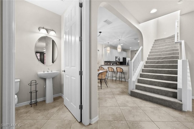 interior space featuring tile patterned flooring