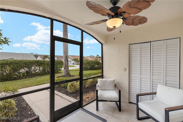 13268 Whitehaven Ln Unit 102, Fort Myers, FL 33966 - sunroom / solarium featuring a ceiling fan and a residential view