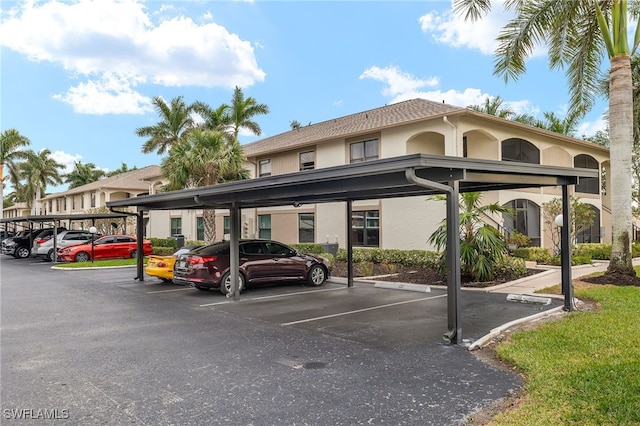 view of car parking featuring a carport