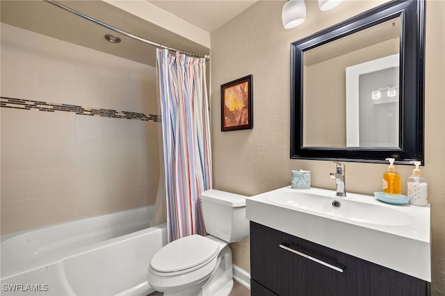 full bathroom with vanity, shower / bath combination with curtain, and toilet