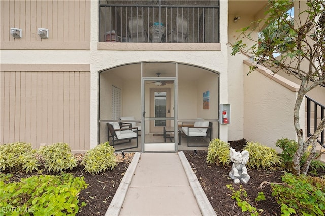 13268 Whitehaven Ln Unit 102, Fort Myers, FL 33966 - property entrance with stucco siding and a balcony