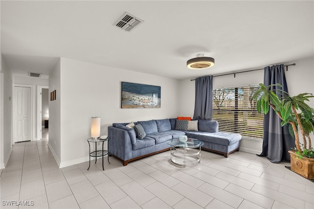 13268 Whitehaven Ln Unit 102, Fort Myers, FL 33966 - living area featuring baseboards and light tile patterned floors