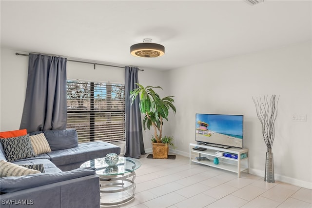 13268 Whitehaven Ln Unit 102, Fort Myers, FL 33966 - tiled living room with baseboards