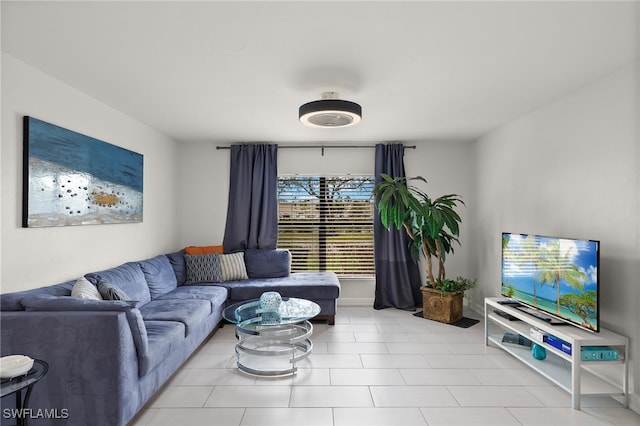 living room with light tile patterned floors