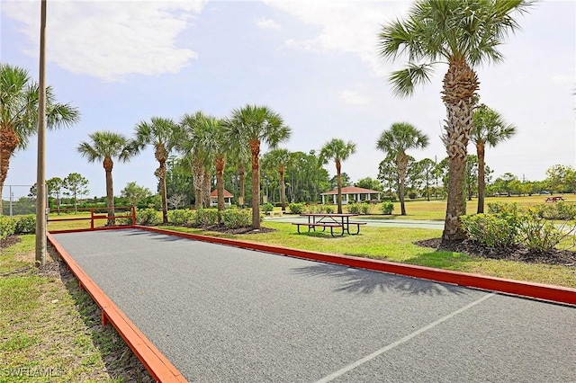 13268 Whitehaven Ln Unit 102, Fort Myers, FL 33966 - surrounding community with a bocce ball area and a yard