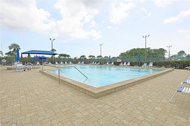 13268 Whitehaven Ln Unit 102, Fort Myers, FL 33966 - community pool featuring a patio area